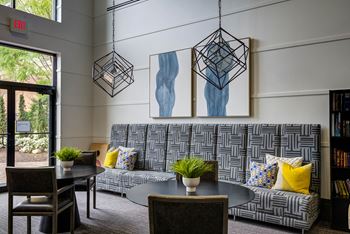 Resident lounge with billiards table, catering kitchen and multiple flat-screen televisions